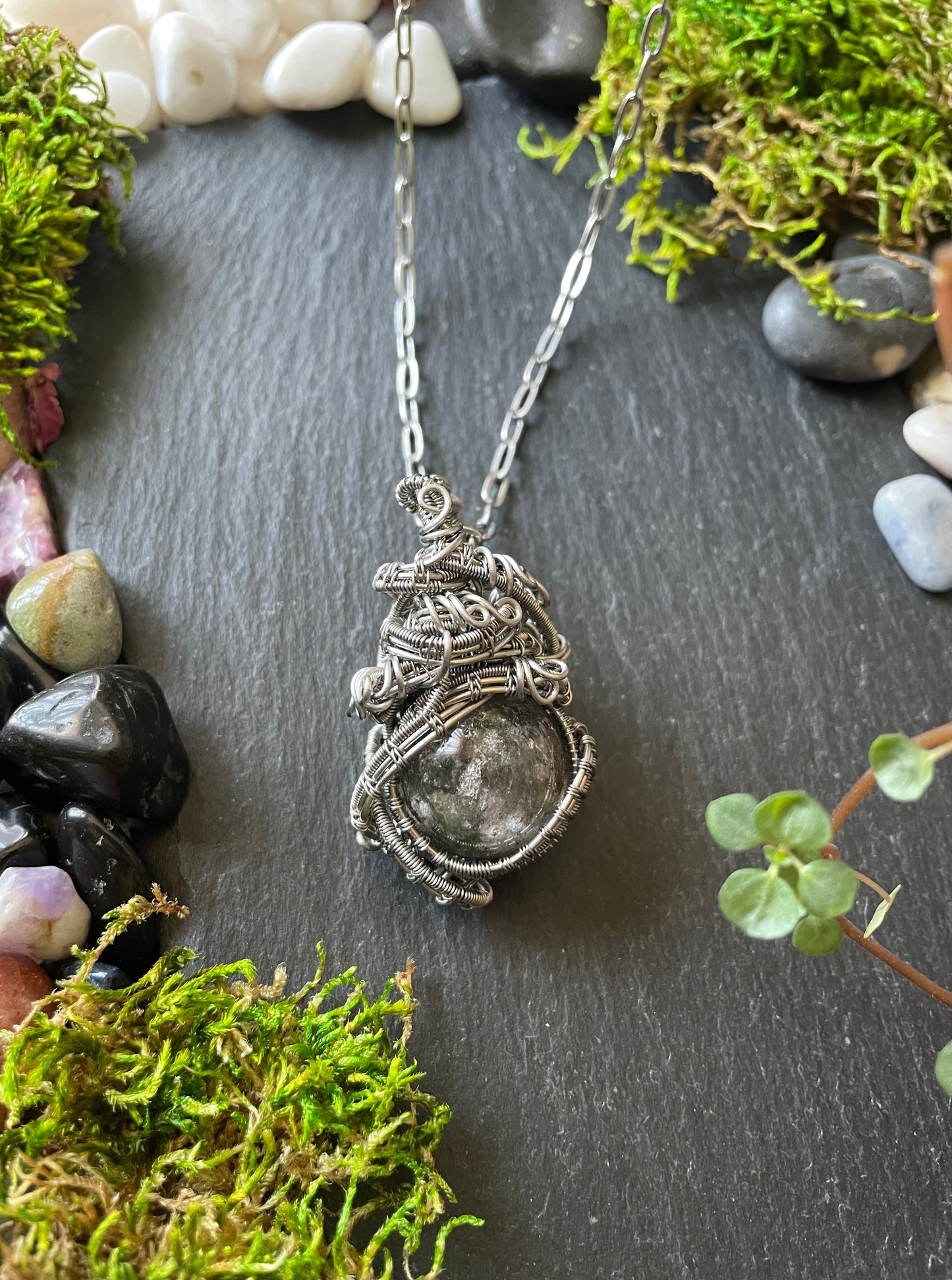Image of crystal ball amulet with garden quartz sphere