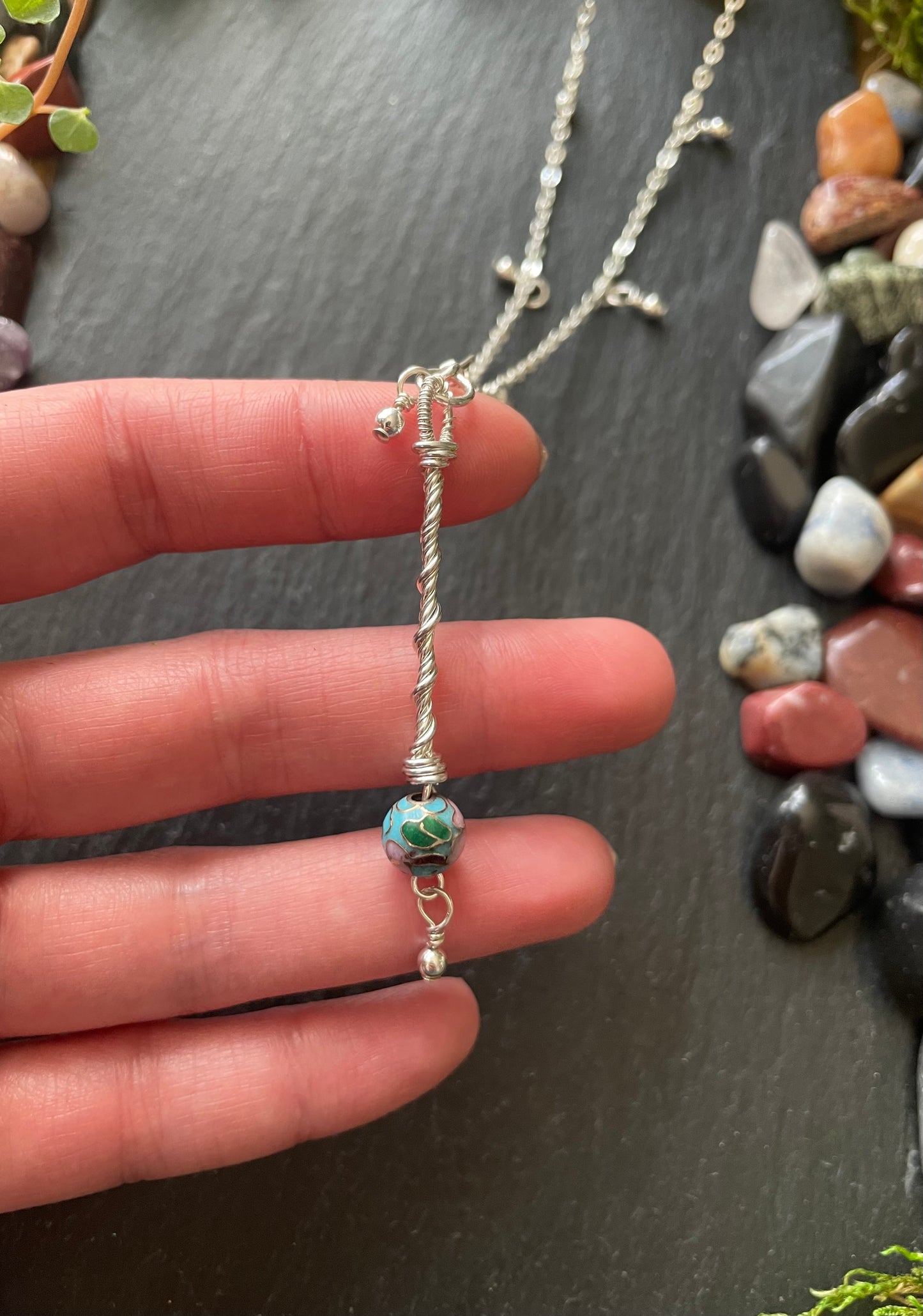Image of a miniature sterling silver fairy wand necklace on sterling chain with blue cloisonne bead