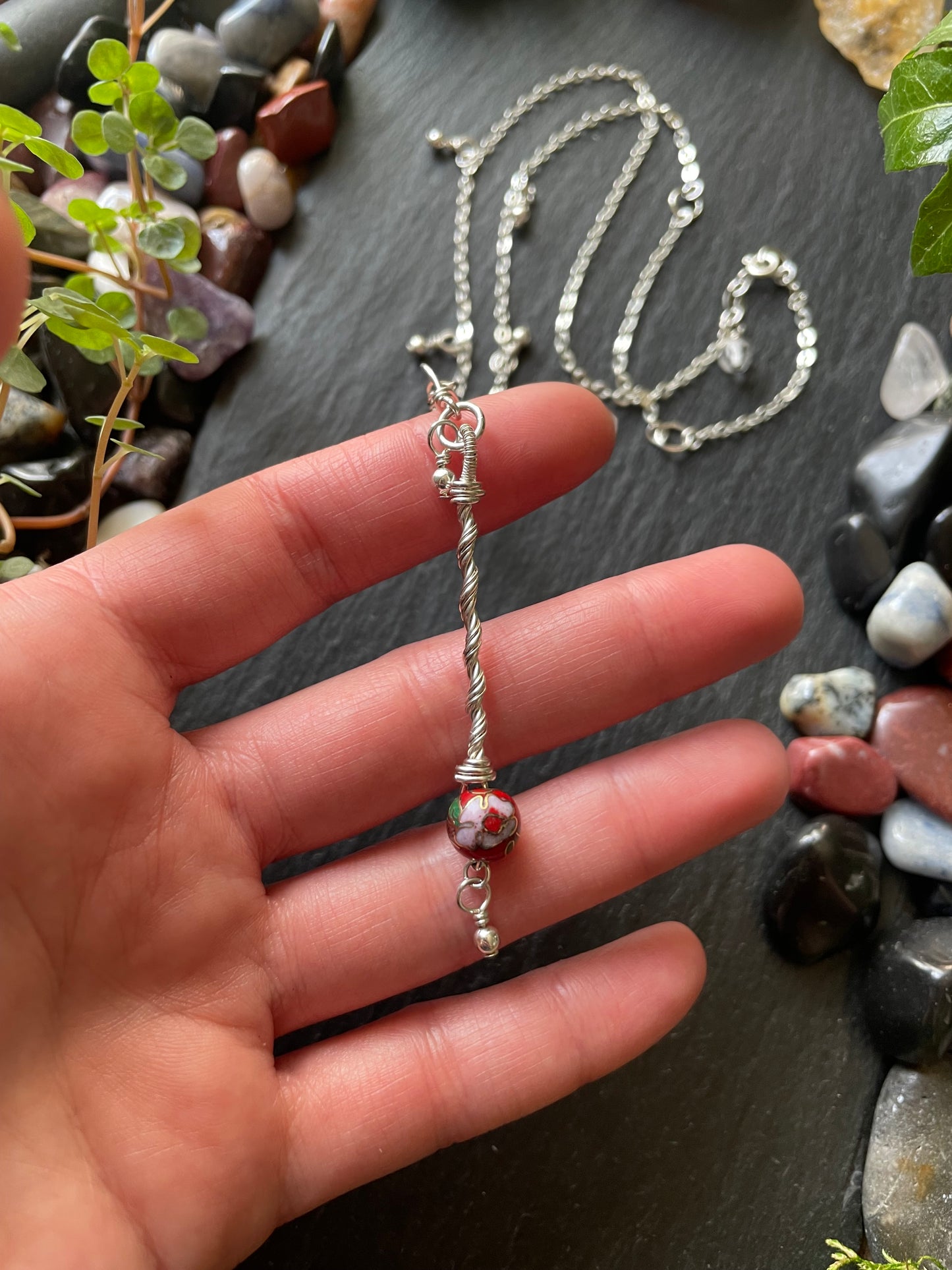 Image of a miniature sterling silver fairy wand necklace on silver chain