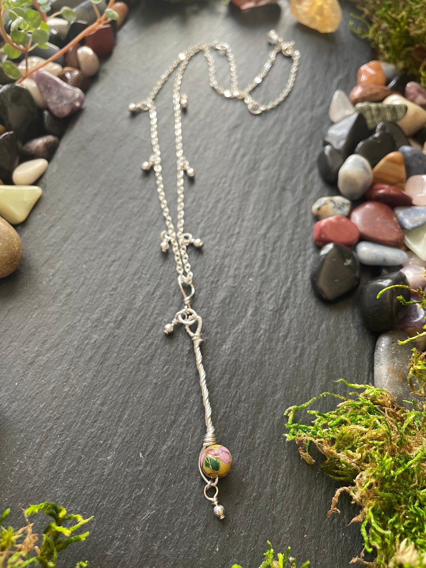 Image of a miniature sterling silver fairy wand necklace on sterling chain with yellow cloisonne bead