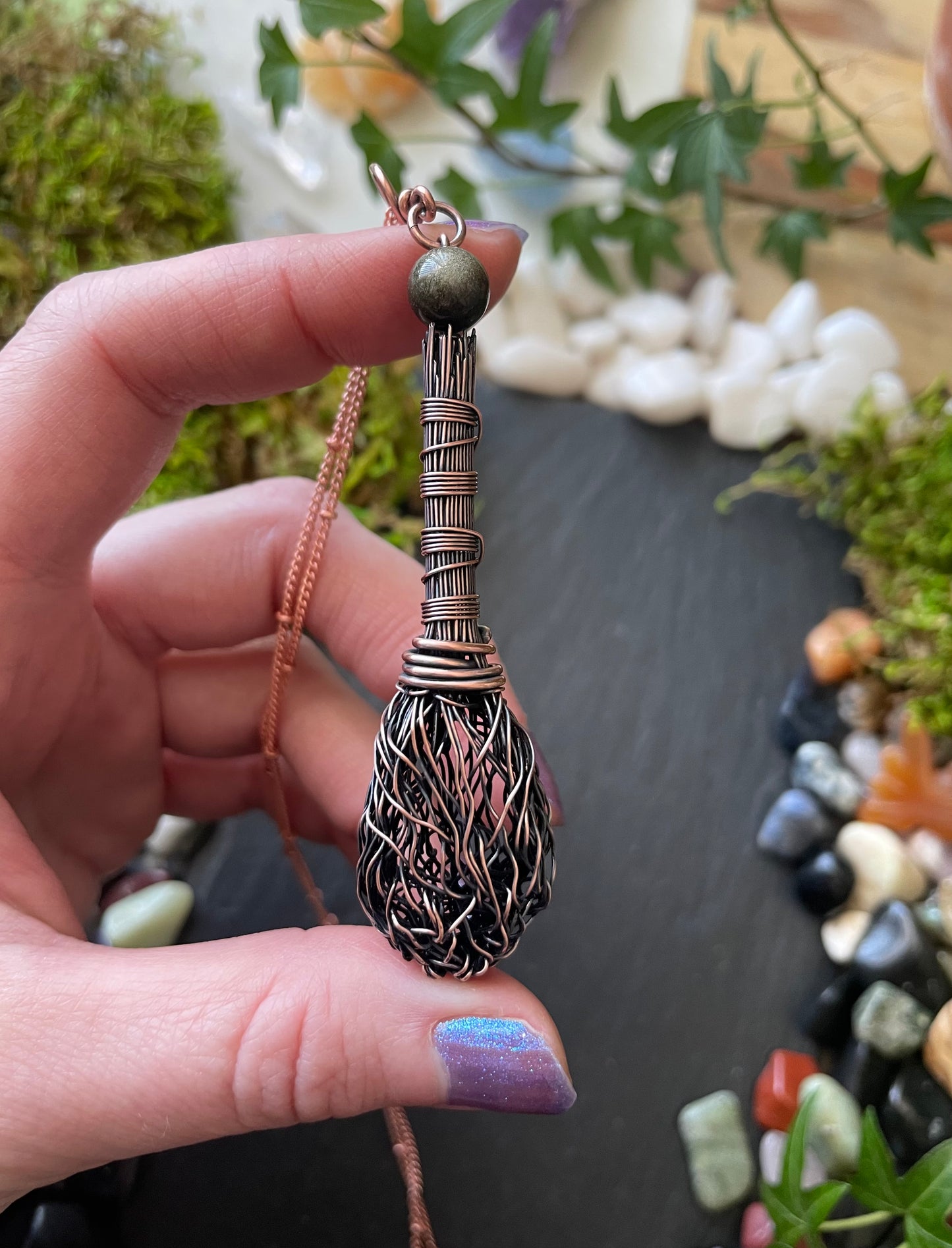 Image of miniature wire handmade broom pendant