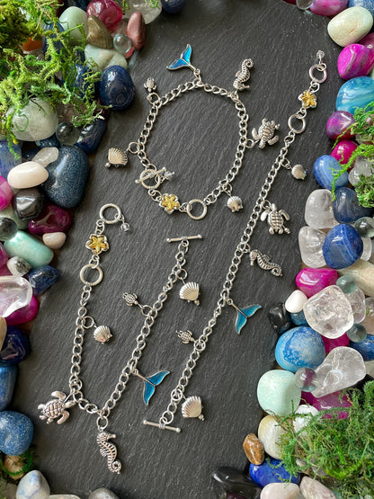 Mermaid Charm Bracelet With Turtle, Clam Shell, Seahorse, And Mermaid Tail Charms
