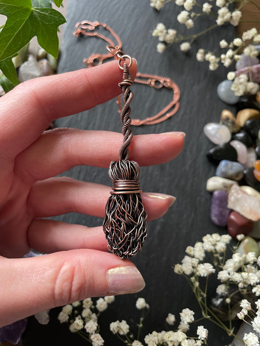 Image of antiqued copper broom pendant