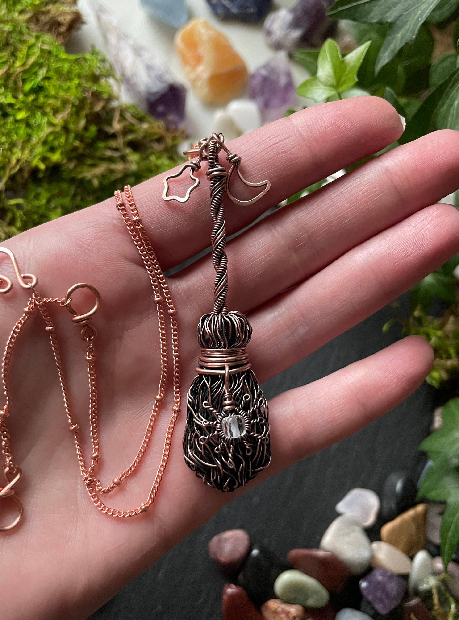 Image of antiqued copper broom pendant