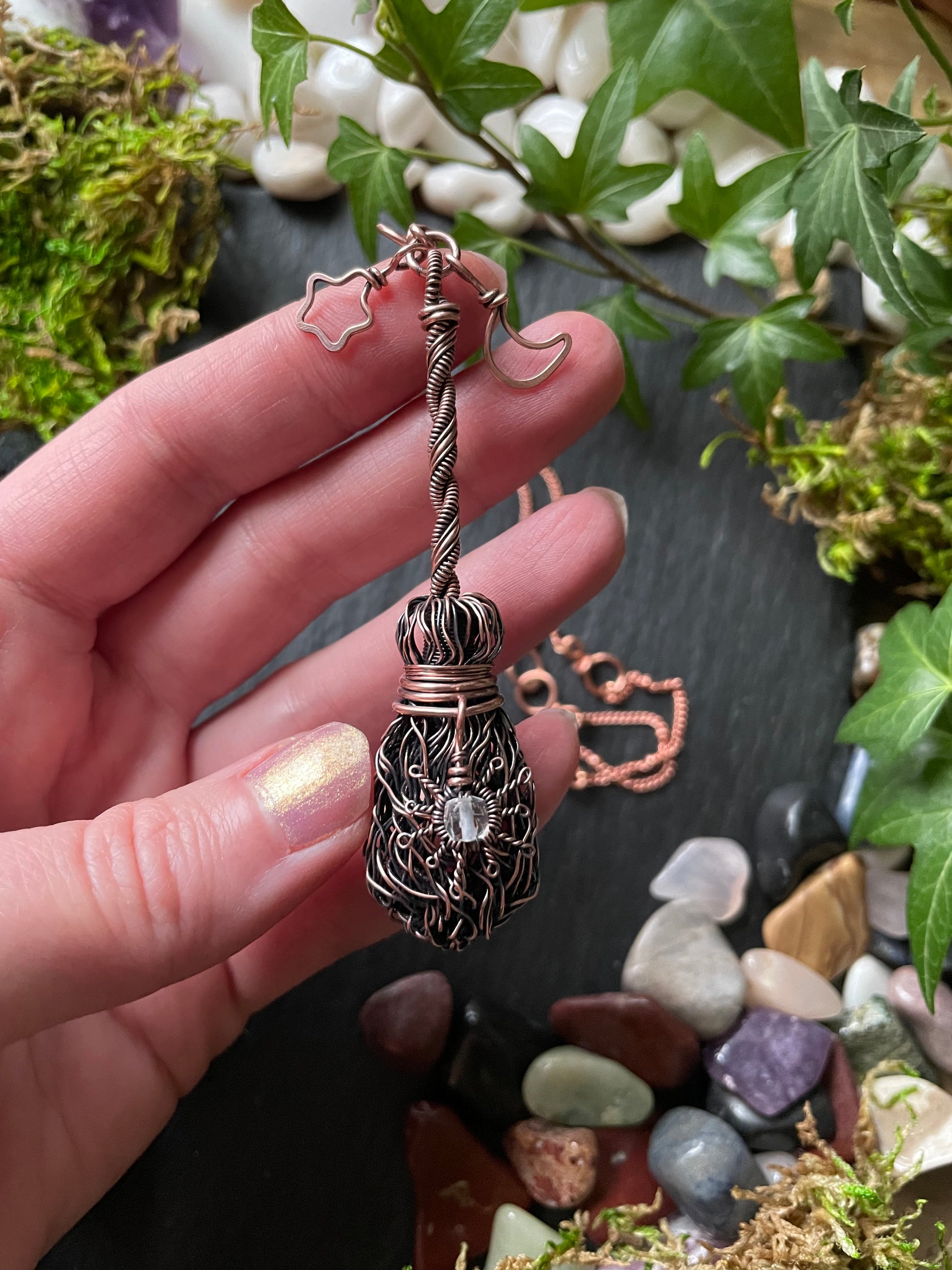 Image of antiqued copper broom pendant 