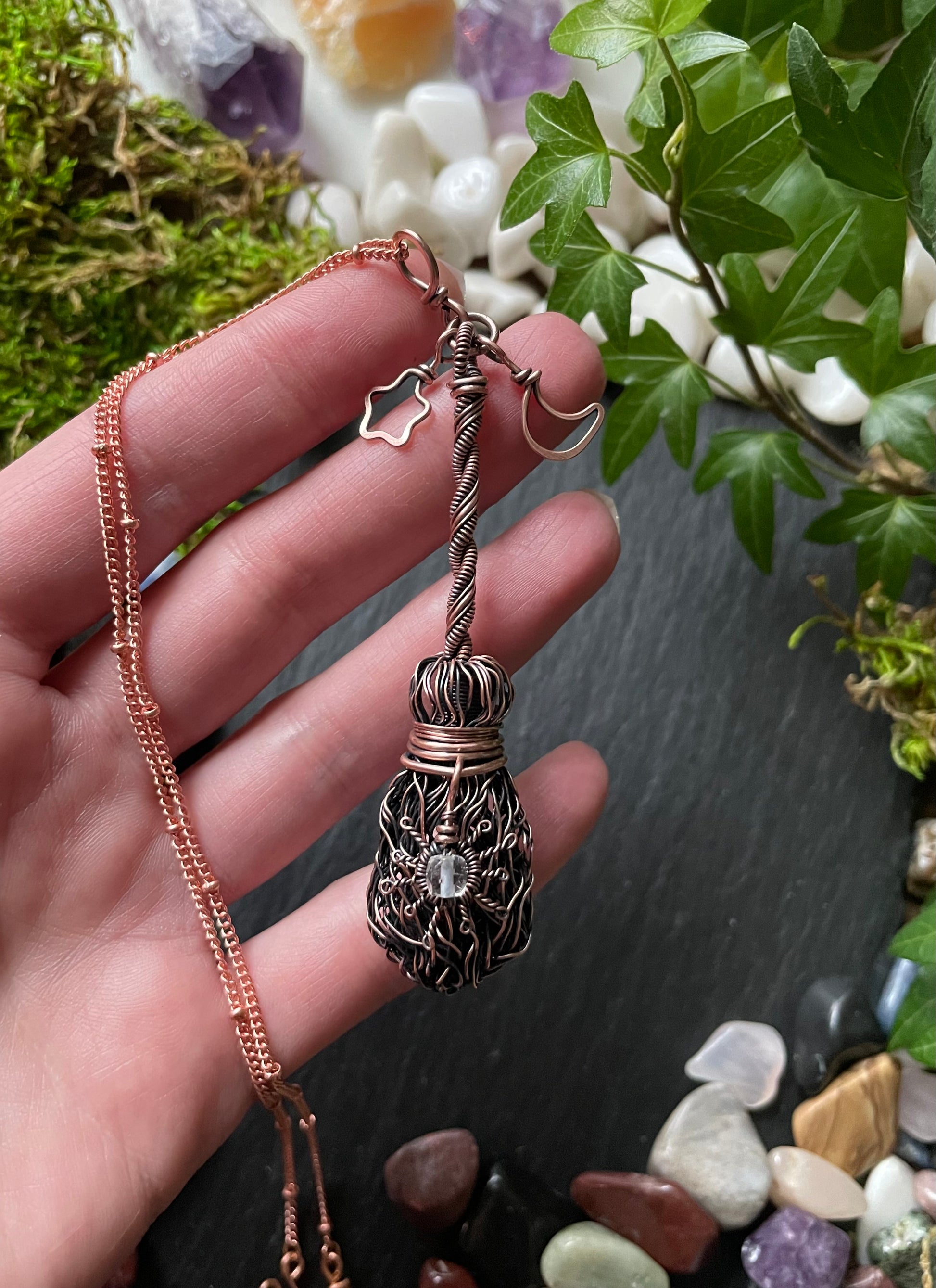 Image of antiqued copper broom pendant