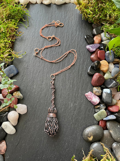 Image of antiqued copper broom pendant with twisted handle