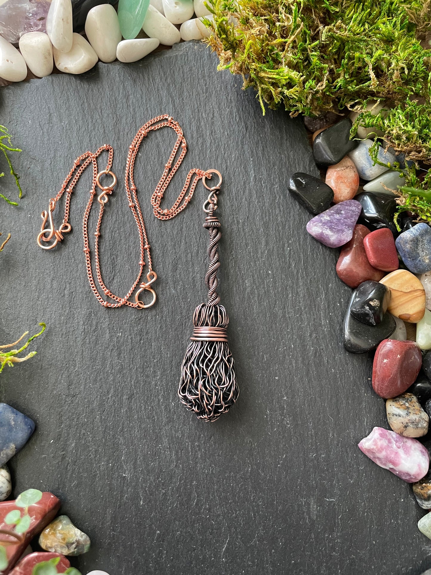 Image of miniature copper wire broom with twisted handle