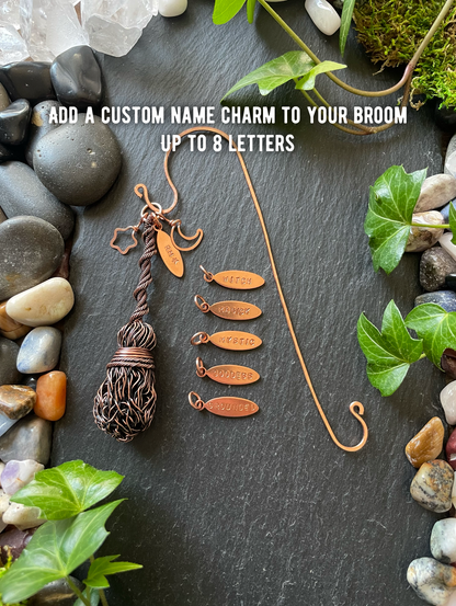 Miniature broom bookshelf charm with name tag options shown
