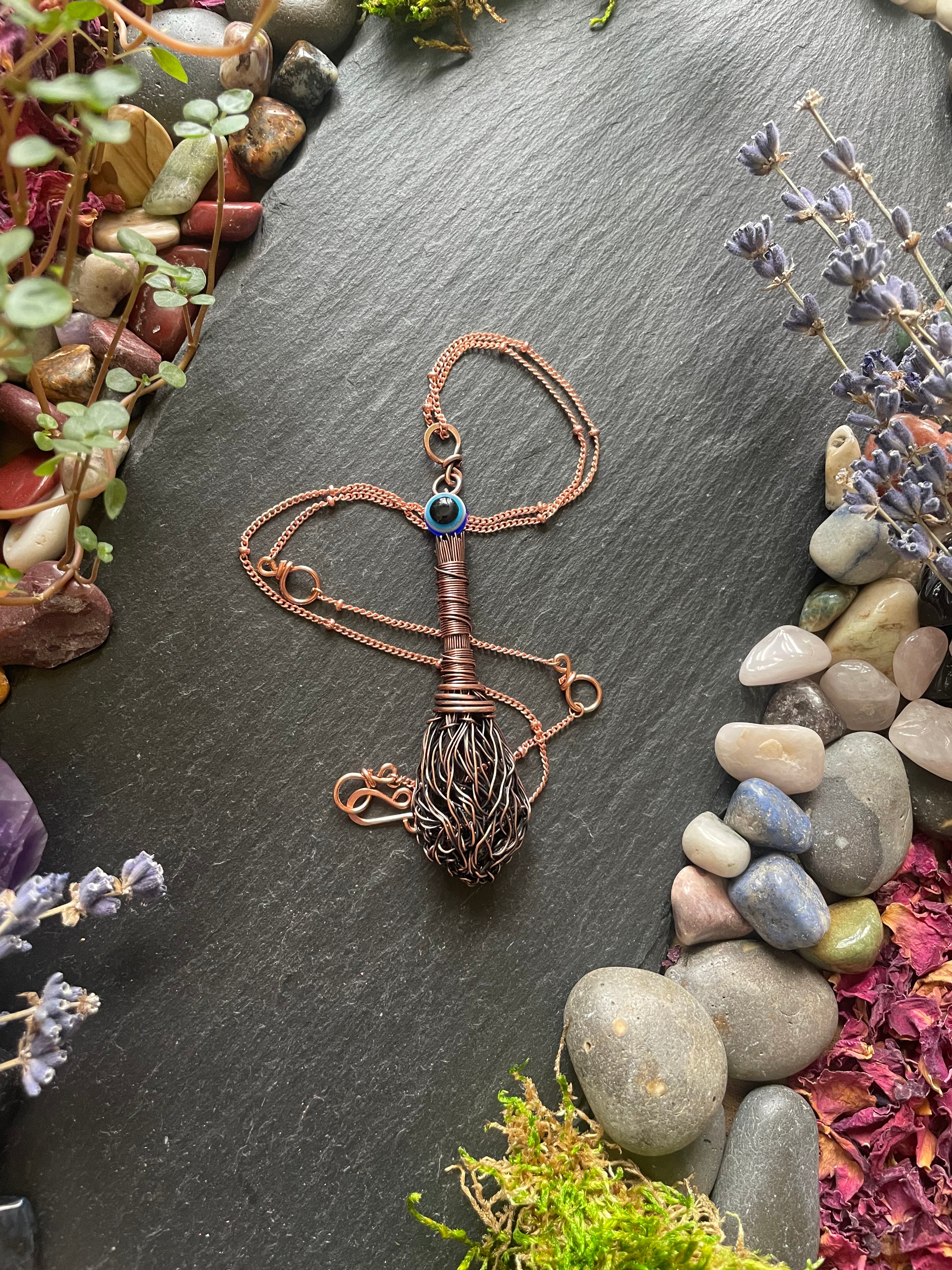 Miniature decorative broom pendant with evil eye bead on copper chain