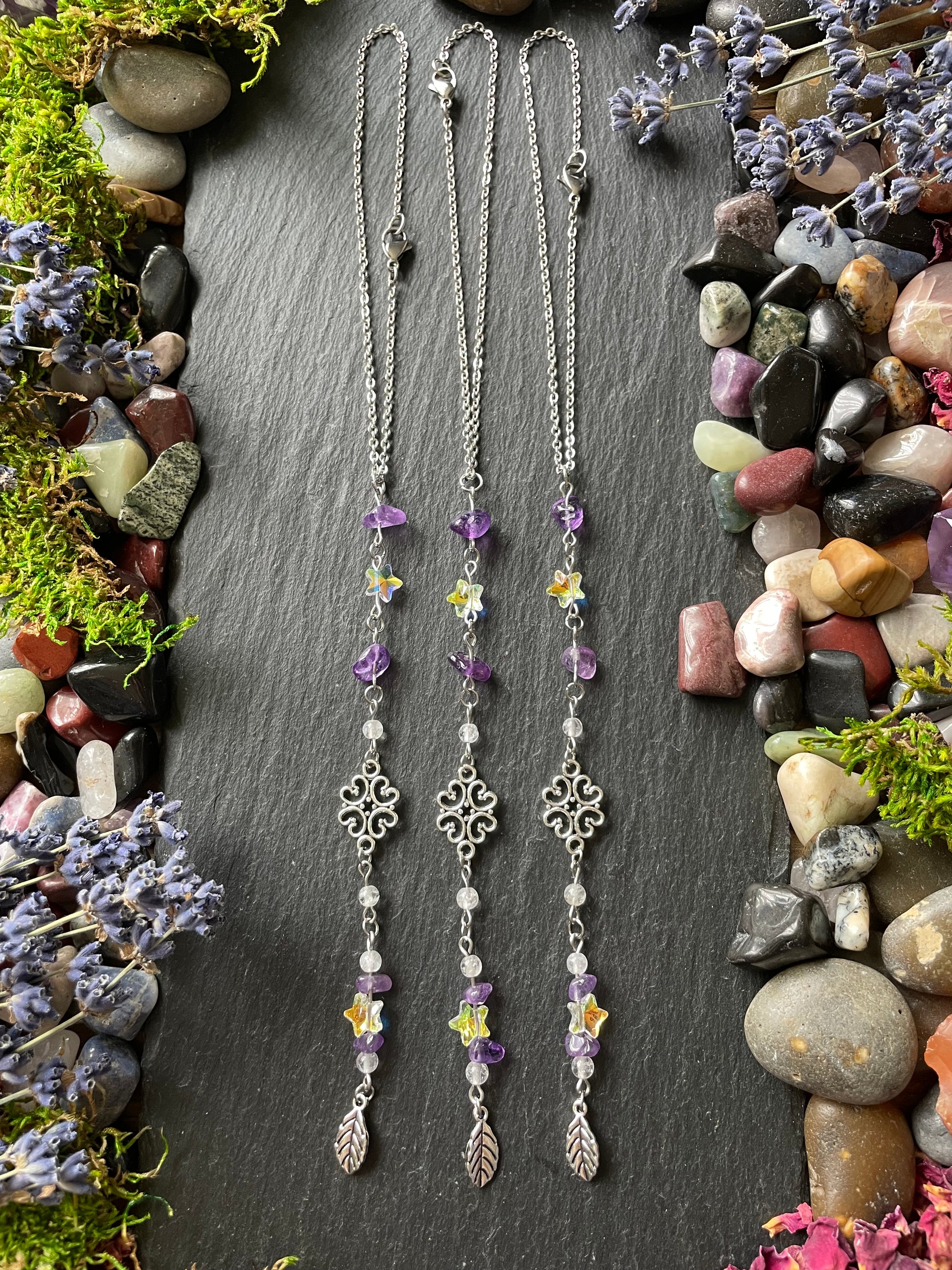 Three crystal car charms with amethyst and star beads, with silver leaf charms