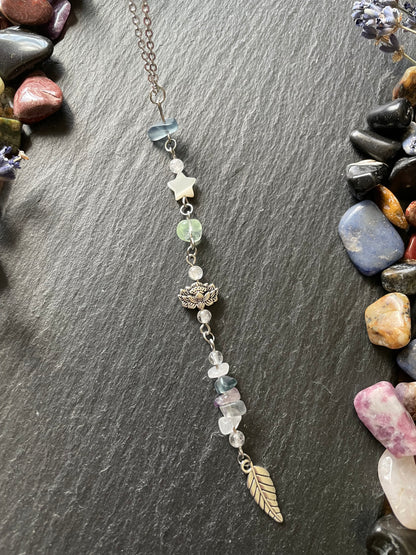 Car charm with purple, blue, and green fluorite crystal beads, lotus flower bead, and silver leaf charm