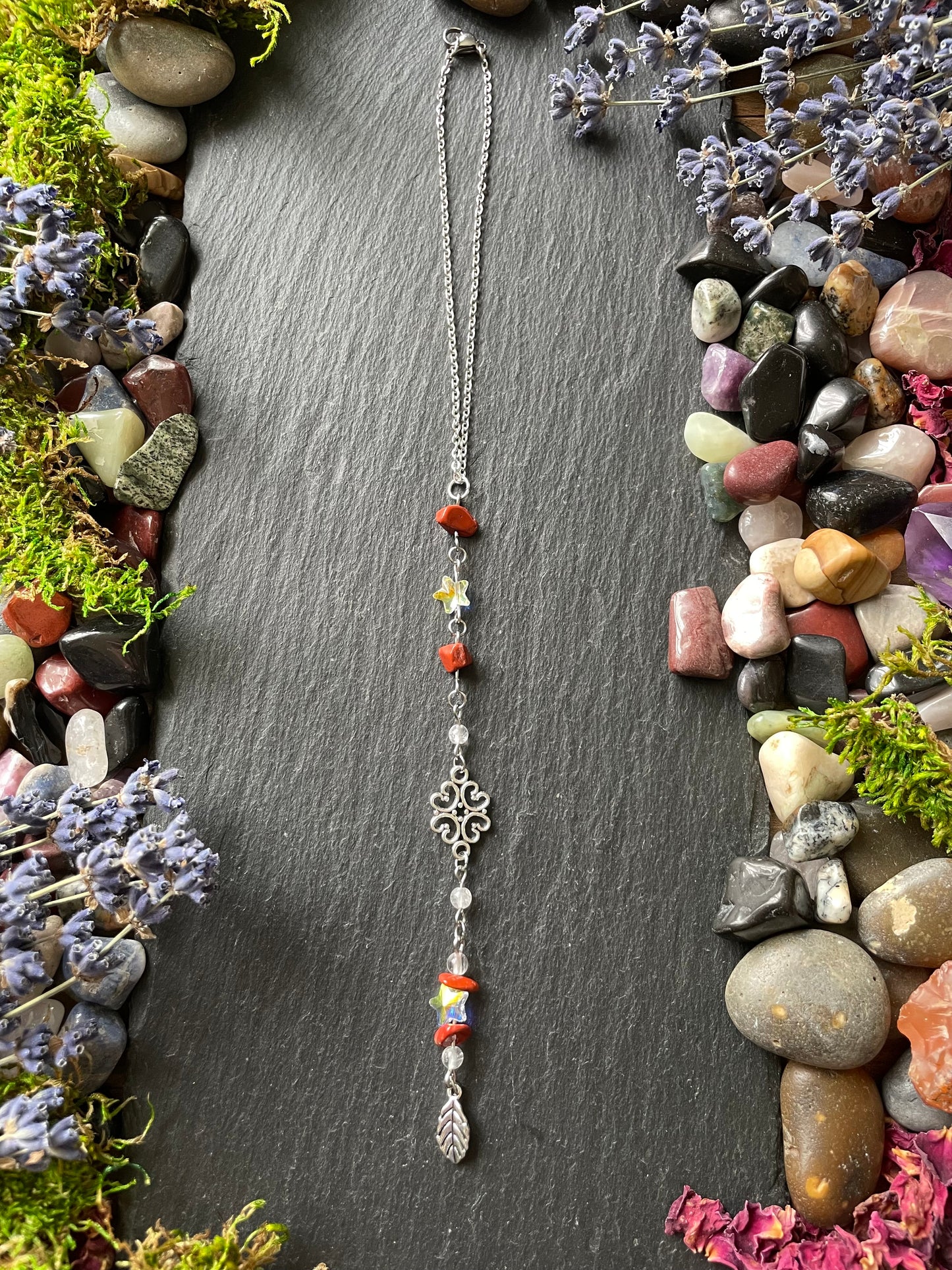 Car charm with red jasper and star beads, with a silver leaf charm