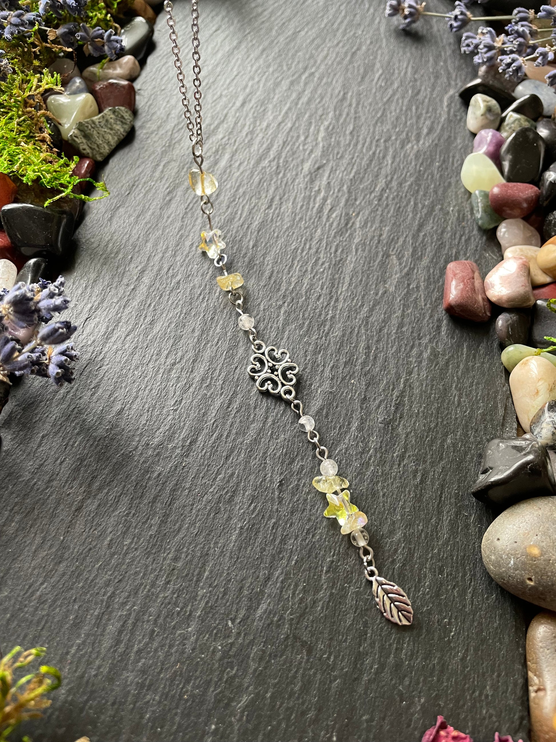 Crystal car charm with yellow citrine and star beads, with silver leaf charm