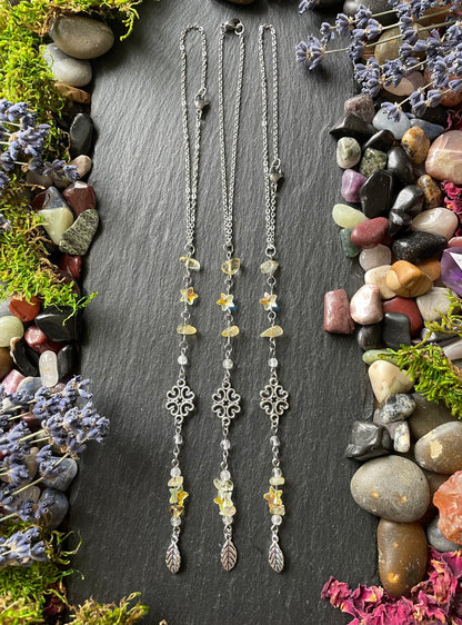 Three crystal car charms with yellow citrine and star beads, with silver leaf charms