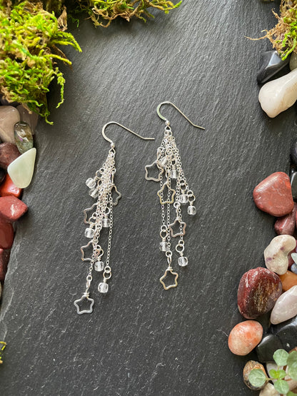 Image of silver shooting star earrings