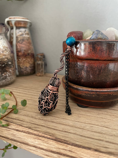 Image of miniature copper broom with blue tigers eye bead and star charm