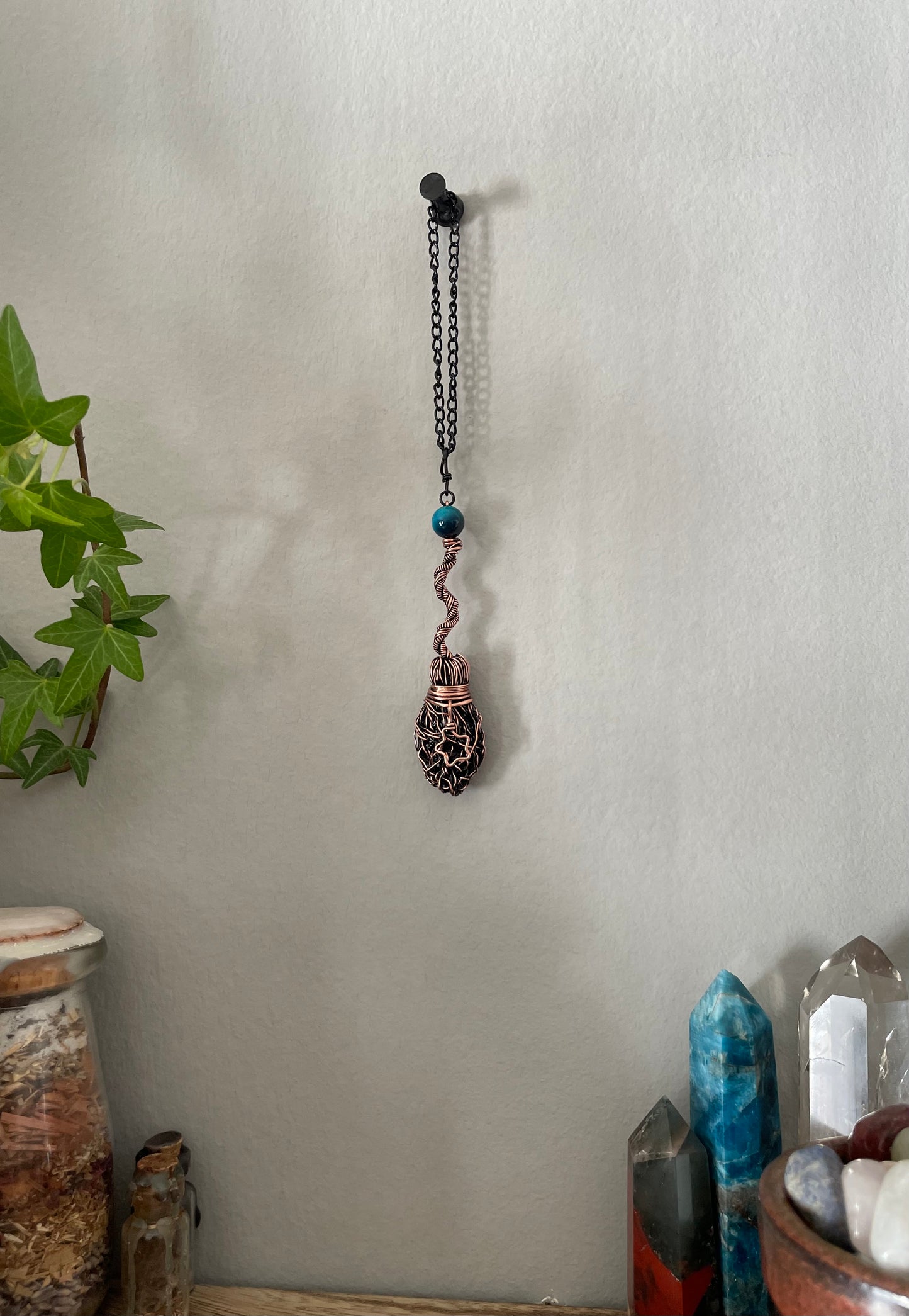 Image of miniature broom decoration with blue tigers eye bead and star charm