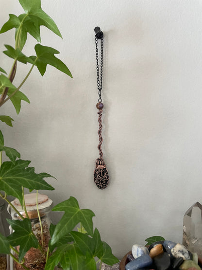 Image of miniature wire witch broom decoration with impression jasper bead