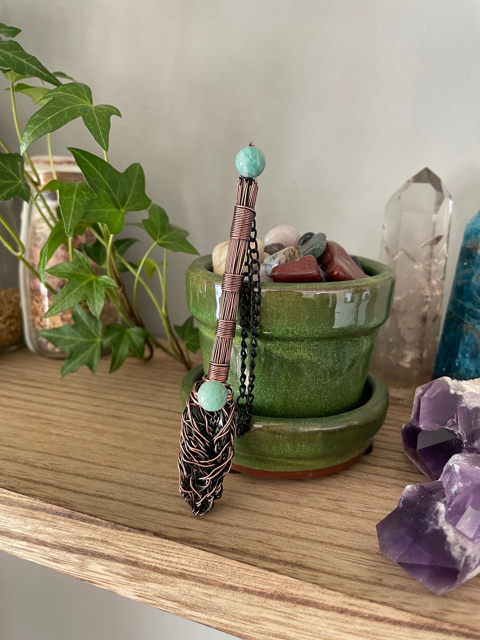 Image of miniature wire witch broom decoration with amazonite bead