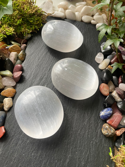 Image of selenite palm stones