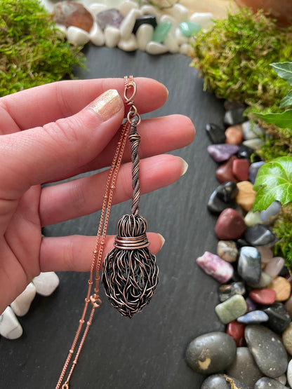 Image of miniature handmade broom pendant