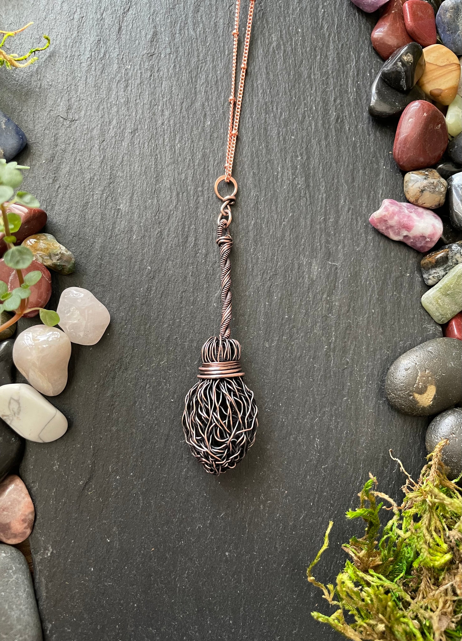 Image of miniature copper wire broom pendant