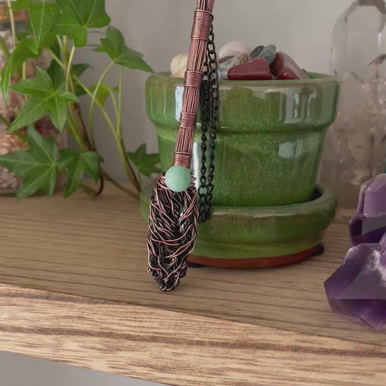 Video of miniature wire witch broom decoration with amazonite bead