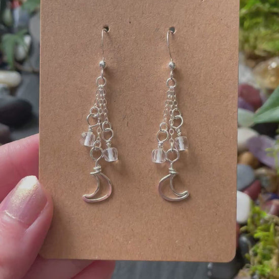 Video of silver moon charm earrings