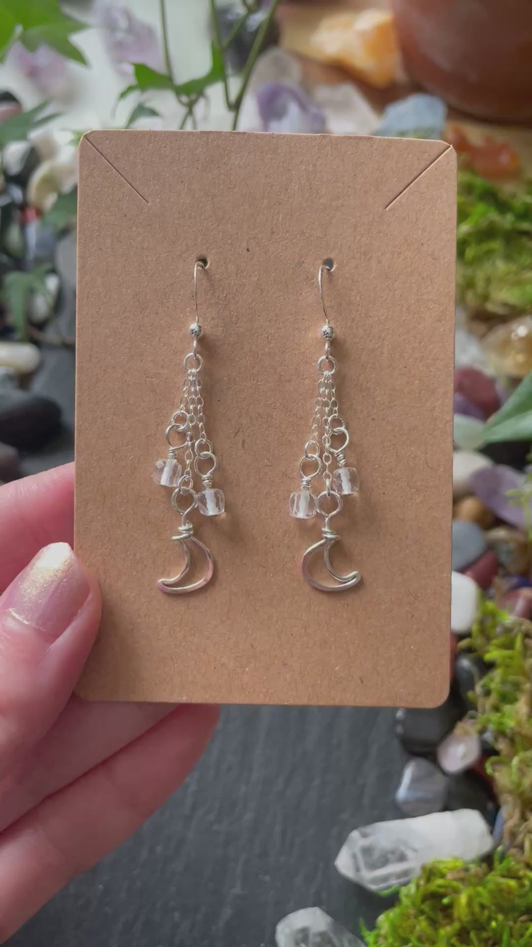 Video of silver moon charm earrings