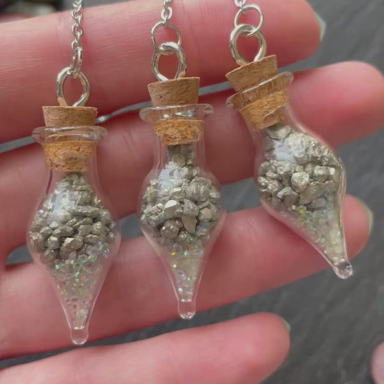 Miniature glass vials with pyrite crystal and sparkles