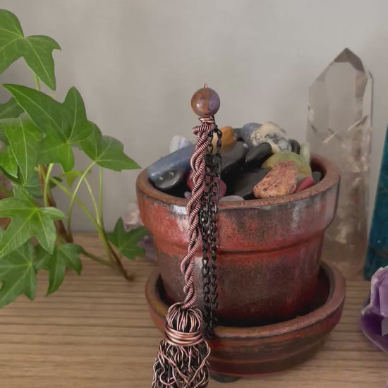 Video of miniature wire witch broom decoration with impression jasper bead