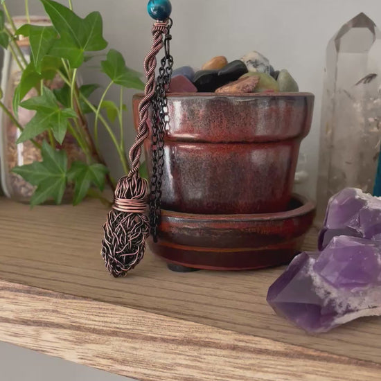 Video of miniature wire witch broom decoration with blue tiger's eye bead