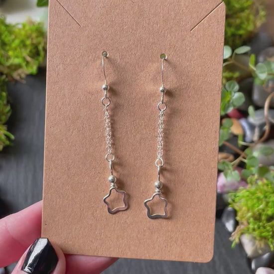 Video of silver star charm earrings