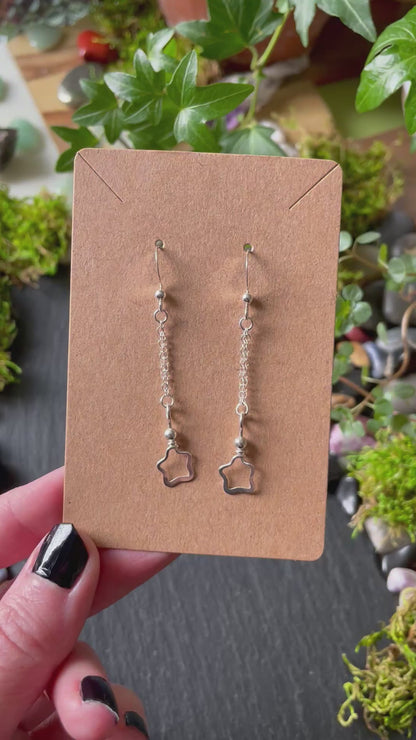 Video of silver star charm earrings