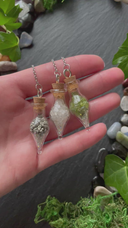 Mini glass vial plant charms with various colorful crystals and sparkles